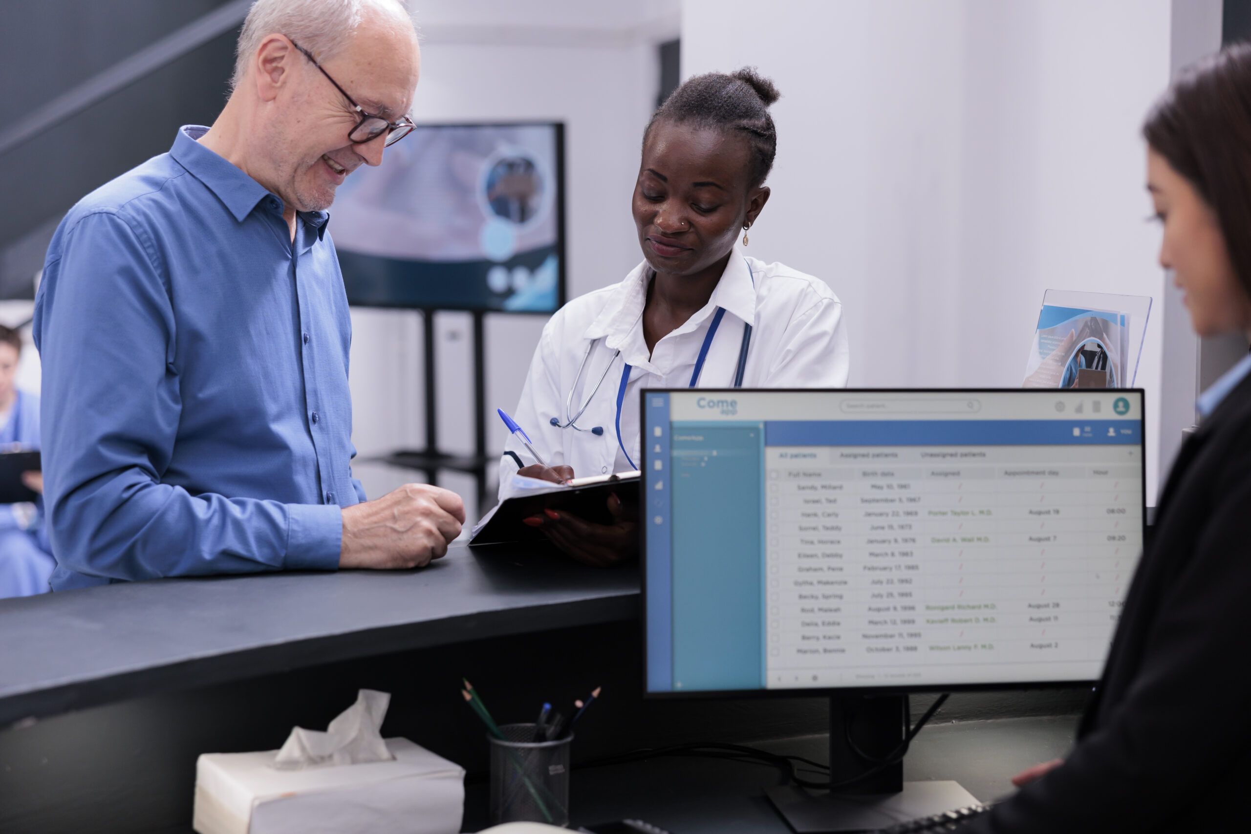 African american doctor showing medical expertise to elderly patient discussing medication treatment